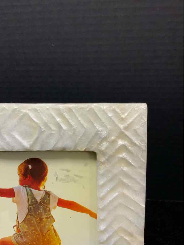 Tommy Bahama Frame